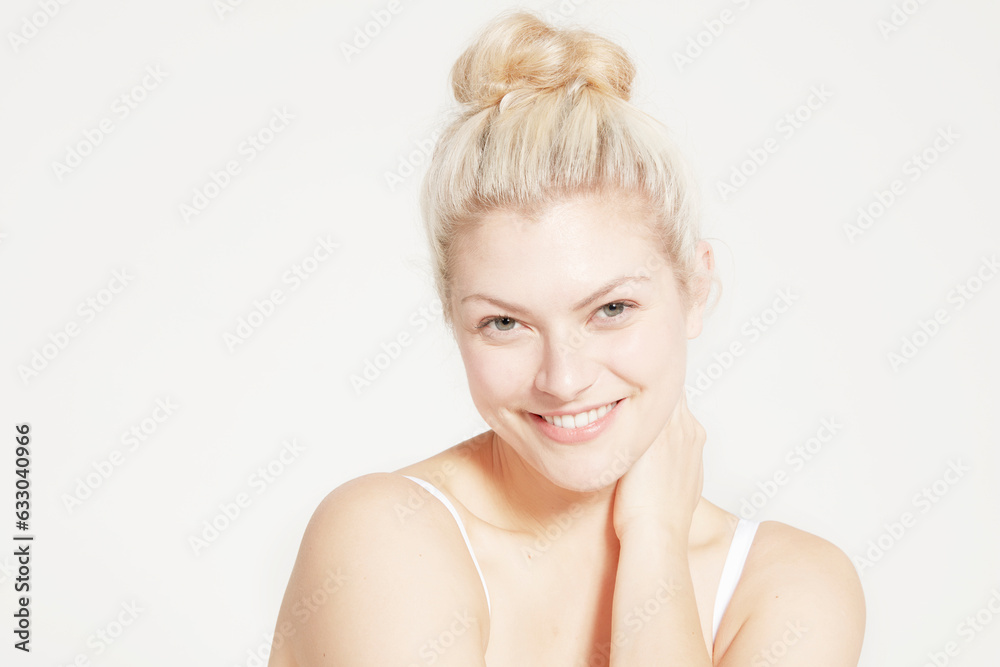 Portrait of model with hair bun.