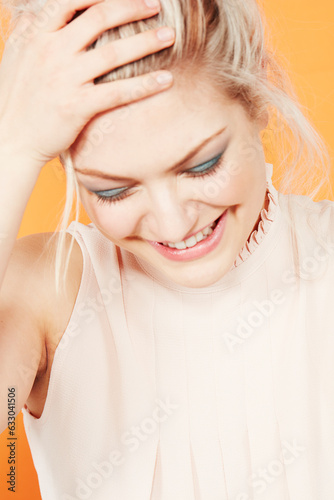 Young woman laughing photo