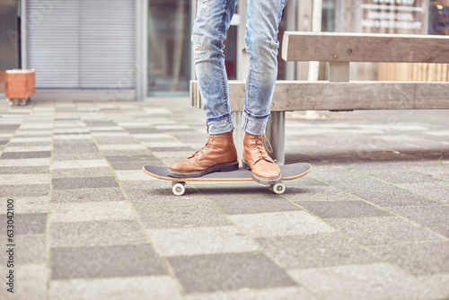 Legs of person using skateboard photo