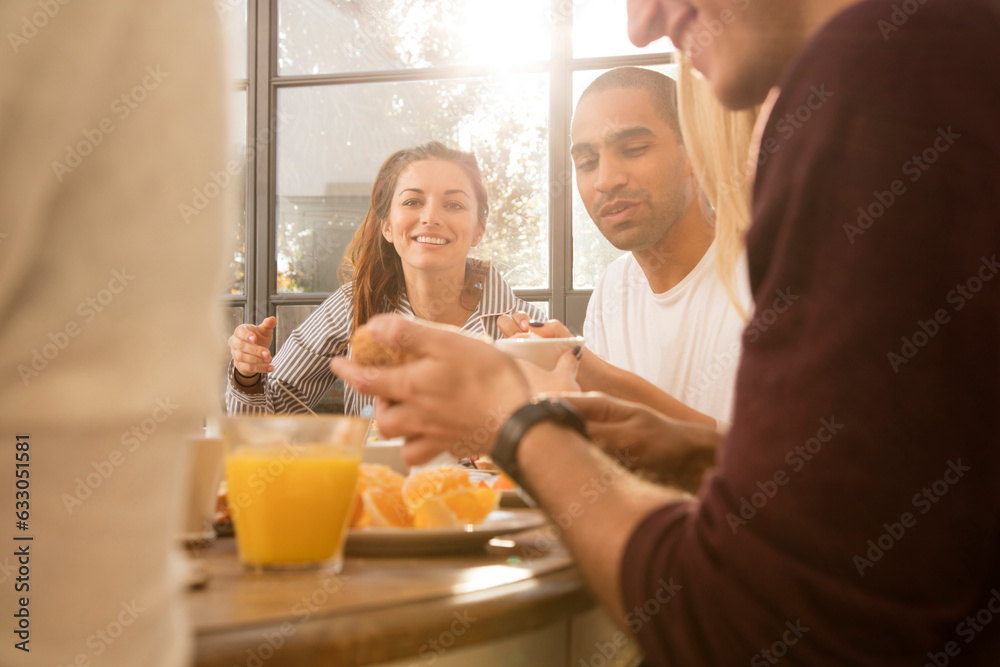 Friends eating breakfast together Friends eating breakfast together