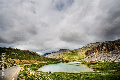 Clouds above Con de la Bonette in France photo