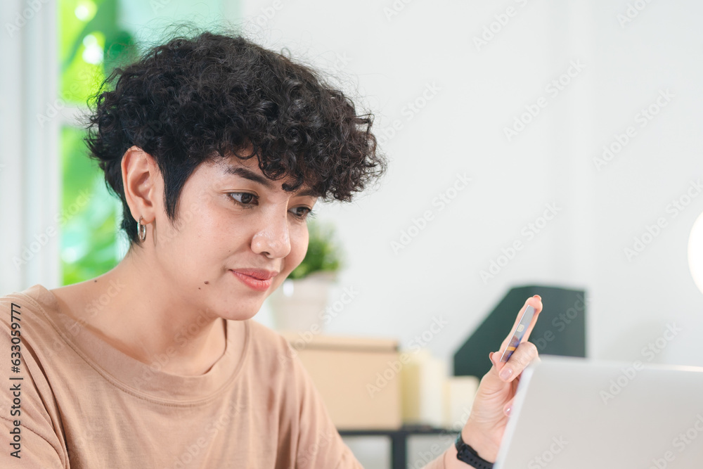Portrait of smart young beautiful Asian business woman, successful female employee smiling with happy job, financial woman satisfied with the results of her work achievement in modern office Portrait of smart young beautiful Asian business woman, successful female employee smiling with happy job, financial woman satisfied with the results of her work achievement in modern office