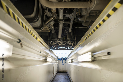 Pit beneath truck photo