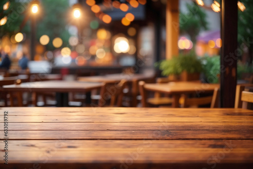 Empty wooden table with a hot cafe on it and bokeh lights blurred outdoor background. Image created using artificial intelligence.