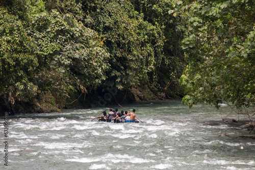 rafting o rubber tubes on Bohorok river, Bukit Lawang, Sumatra, Indonesia photo