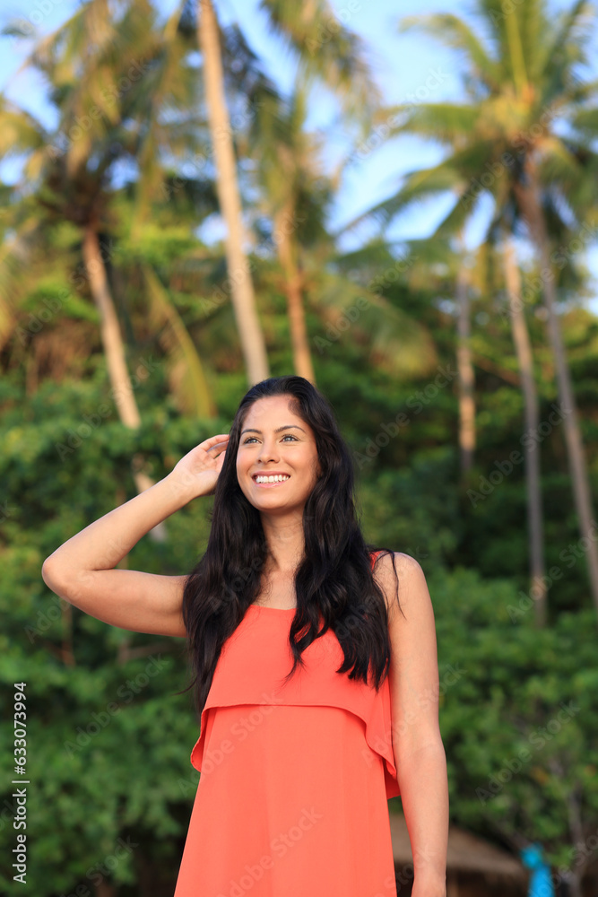 Young woman wearing orange smiling Young woman wearing orange smiling