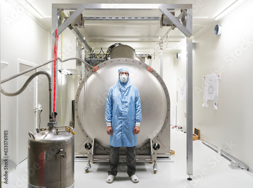 Man in face mask by gas cannister at Paranal Observatory