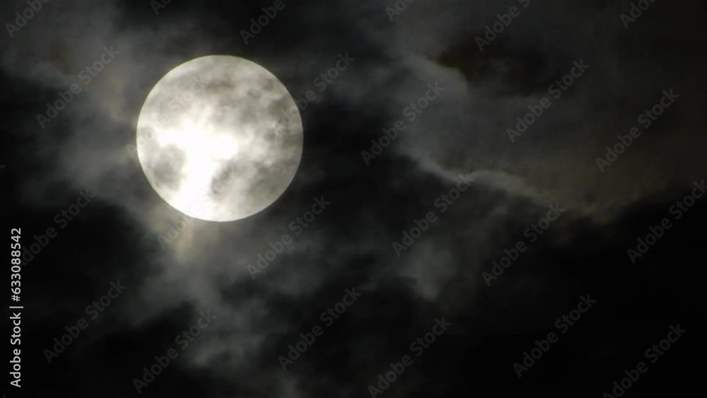 Big White Super Moon With Moon Light And Clouds Passing In Front Big White Super Moon With Moon Light And Clouds Passing In Front