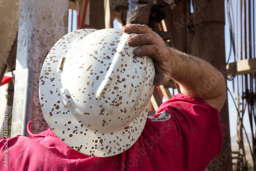 Worker with dirty hardhat