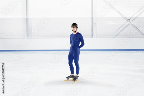 Speed skater in blue uniform at ice rink