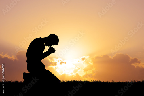 A lonely and desperate man praying to God.