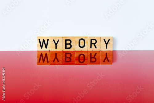Polish white and red colors and the word, WYBORY, in Polish, meaning parliamentary elections, The concept of elections in Poland in October 2023