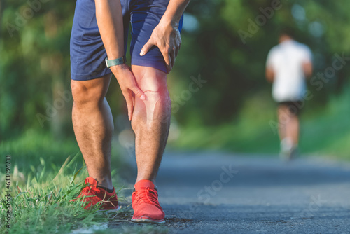 Fotografie, Obraz male athlete up close, Knee soreness following activity