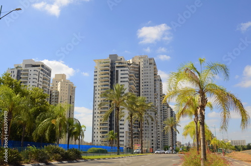 Modern residential area in Petah Tikva. Israel. June 2, 2023. high-rise buildings, roadway