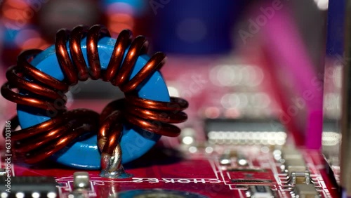 Close up of inductor copper coil on circuit board