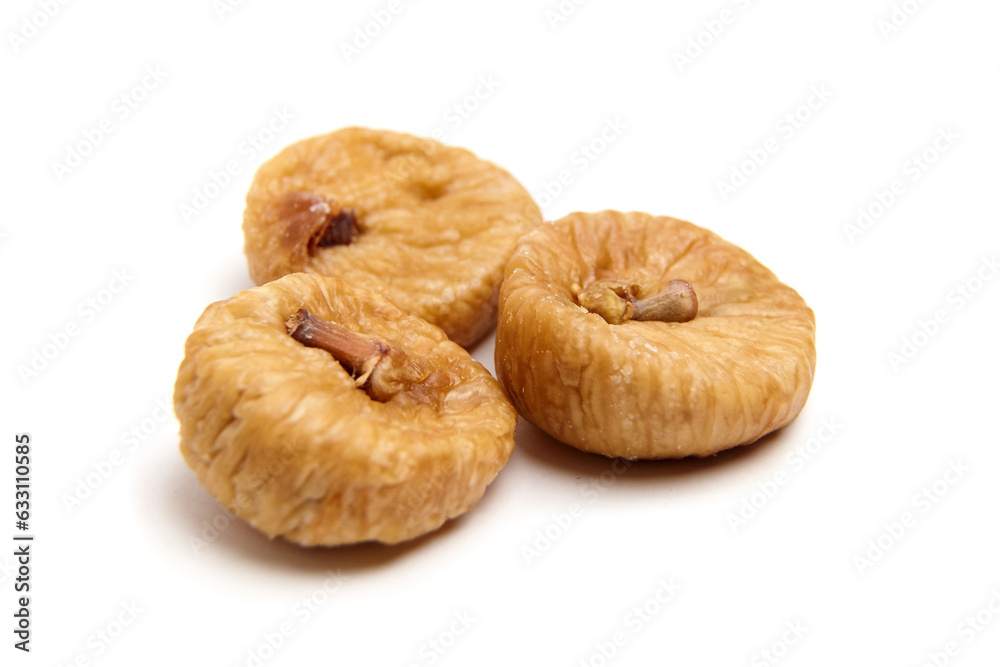 Dried fig fruits isolated on white. Three sweet sundried figs Dried fig fruits isolated on white. Three sweet sundried figs