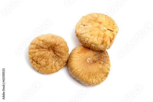 Dried fig fruits isolated on white. Three sweet sundried figs, top view
