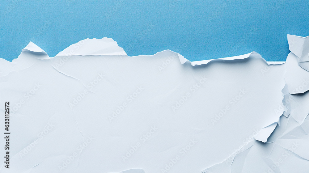 Obraz premium Pieces of crumpled torn white paper on a blue background