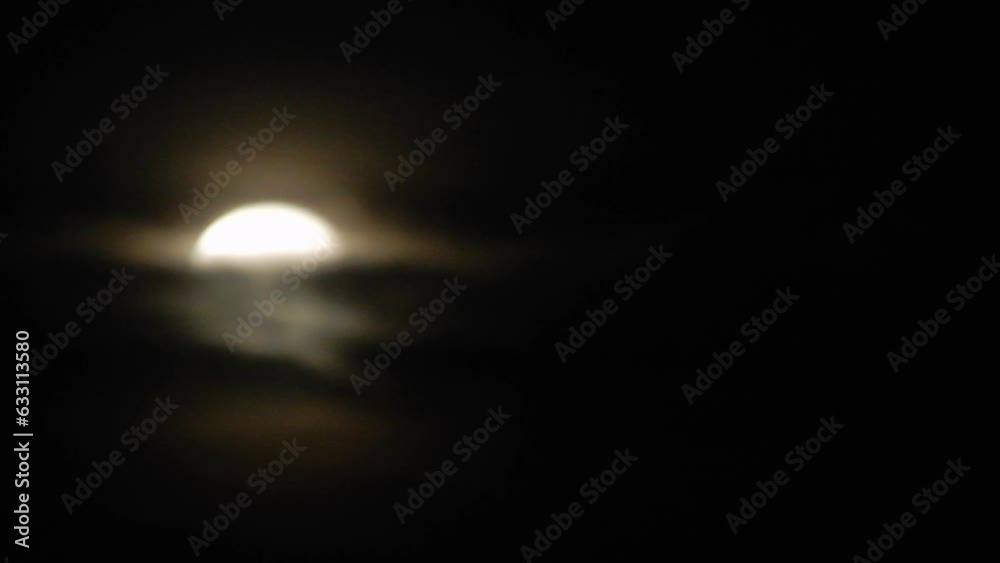 Dreamy Looking Slightly Blurred White Moon In Night Sky With Clouds Dreamy Looking Slightly Blurred White Moon In Night Sky With Clouds