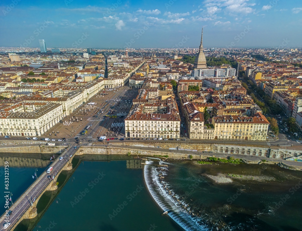 The drone aerial view of Turin city centre with Mole Antonelliana and River Po, Piedmont region of Italy. The drone aerial view of Turin city centre with Mole Antonelliana and River Po, Piedmont region of Italy.