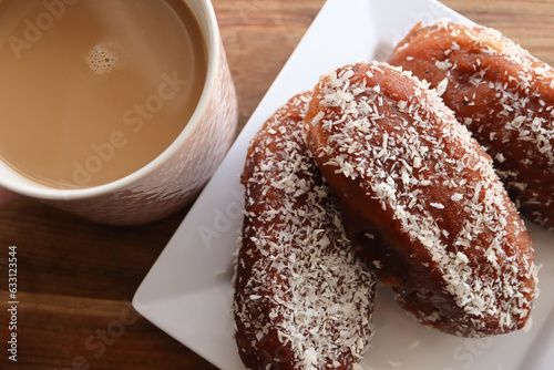 South African koesisters with cup of coffee. 