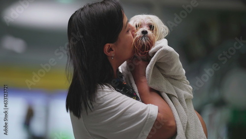 Photos Local Pet Shop Owner and Employee Proudly Display Shih Tzu Pet After Bath