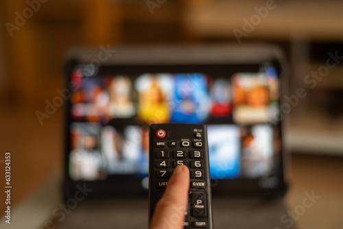 Tv Online. Hand Holding TV Remote Control. Multimedia Streaming Concept. Video Service With Internet Streaming Multimedia Shows, Series.