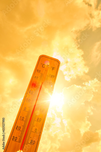 Canvastavla Thermometer against background hot, summer yellow sun