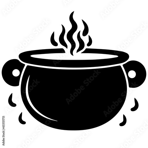 black cauldron with boiling magic potion