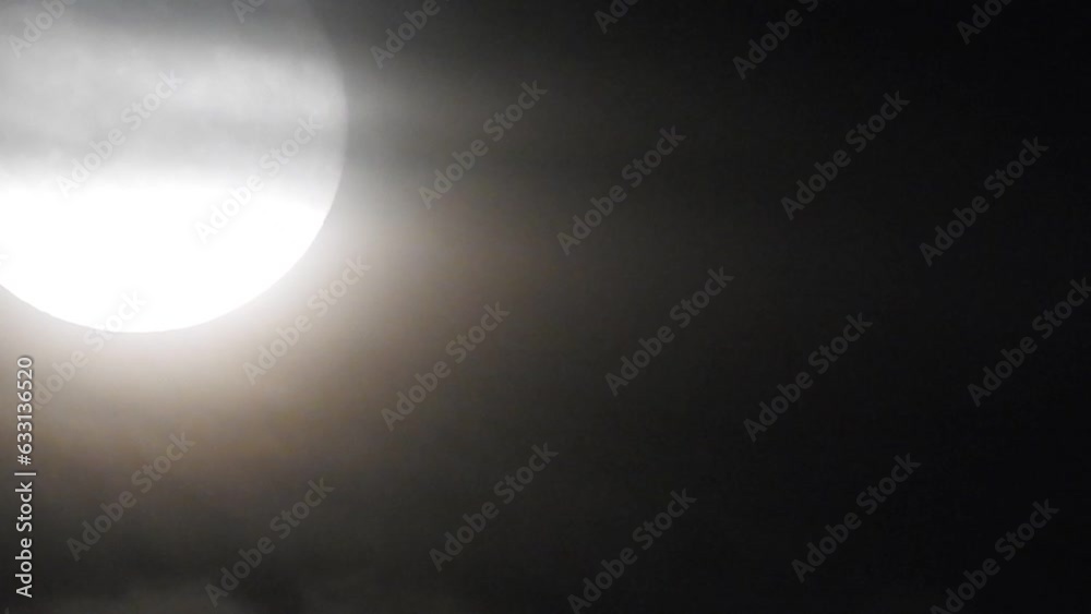 Bright Super Moon At Night With Black Clouds Bright Super Moon At Night With Black Clouds