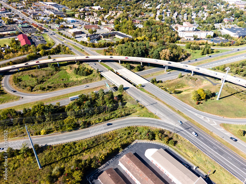 large multi-level road junction in the city of Leesburg, Virginia. View from a drone on a sunny day.
