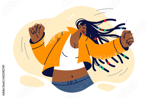 Dancing woman with african american appearance and long dreadlocks enjoying disco or friday party