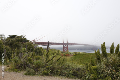 Some fog with little visibility in the Golden Gate bridge of San Francisco photo