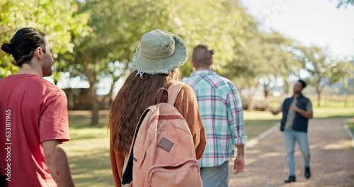 Back, walking and student friends on campus for a university tour of the college grounds together. School, education and orientation with a group of academic learners outdoor for higher learning