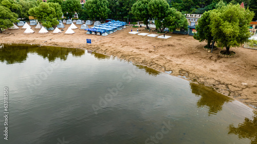 Lakes, beaches and tents - the scenery of Nanhu Park in Changchun, China in summer