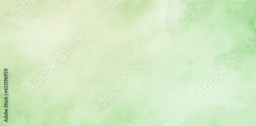 Abstract green pastel watercolor stains background on watercolor paper textured for design templates invitation card
