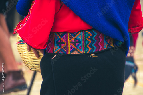 Embroidered details of the clothing of the indigenous woman Saraguro, Ecuador. photo