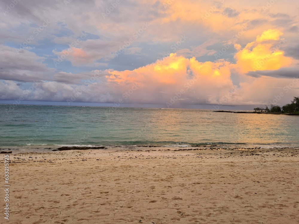 Idyllic sunset sky with cloud on sea beach sand wave exotic summer vacation Idyllic sunset sky with cloud on sea beach sand wave exotic summer vacation
