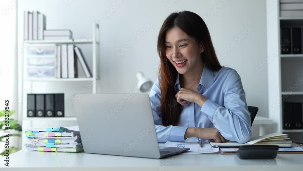 Happy young asian businesswoman using laptop computer to contact, chat, communicate, search, report, document business information to client, foreign investor. online business ideas. Happy young asian businesswoman using laptop computer to contact, chat, communicate, search, report, document business information to client, foreign investor. online business ideas.