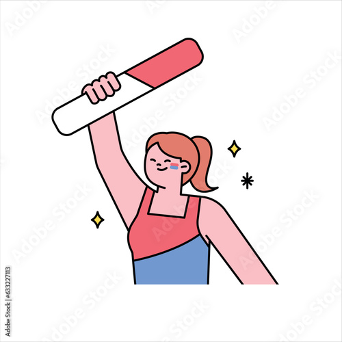A girl is cheering with a cheering stick in her hand. Supporters cheering for a sports team.