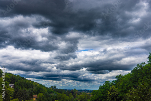 Timelapse of storm clouds over the hills in the countryside, Croatia photo