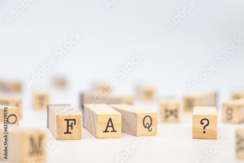 Wallpaper Mural FAQ Text in wooden cubes on white background Torontodigital.ca