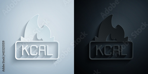 Paper cut Kcal icon isolated on isolated on grey and black background. Health food. Paper art style. Vector
