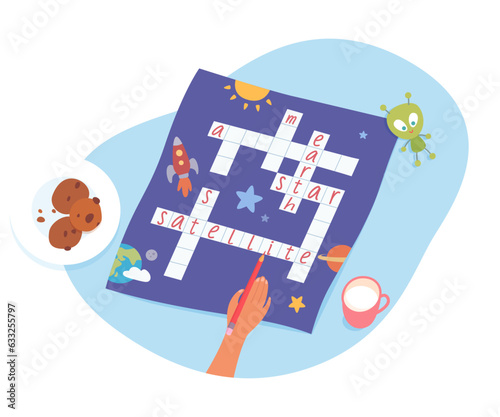 Solving crossword, top view on hand holding pencil to solve space riddle and fill letters