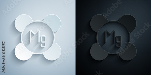 Paper cut Magnesium chemical element icon isolated on isolated on grey and black background. Paper art style. Vector