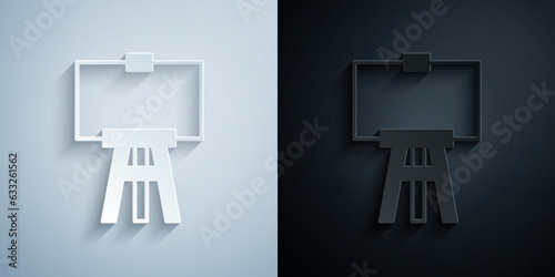 Paper cut Wood easel or painting art boards icon isolated on grey and black background. Paper art style. Vector