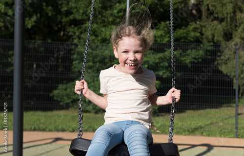 child on swing