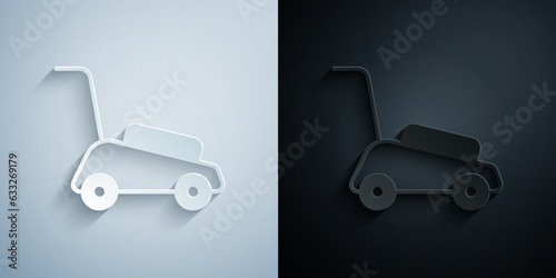Paper cut Lawn mower icon isolated on grey and black background. Lawn mower cutting grass. Paper art style. Vector