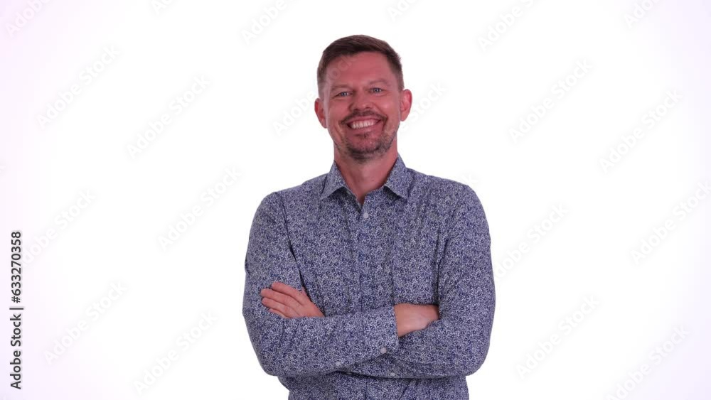 Young handsome man happy face smiling with crossed arms looking at camera. Positive successful joyful man Young handsome man happy face smiling with crossed arms looking at camera. Positive successful joyful man