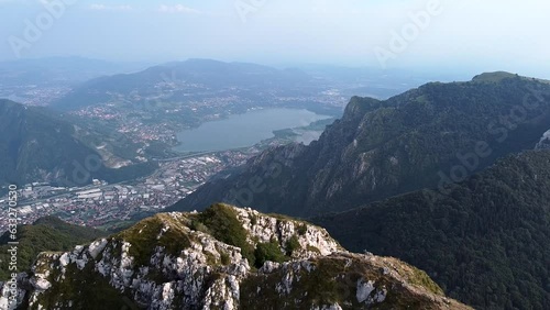 View of Lago di Annone from Corni di Canzo rocky peak photo